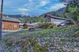 Nestled in a picturesque mountain setting, this charming property offers a tranquil escape.