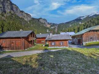 Nestled in a picturesque mountain setting, this charming property offers a unique blend of rustic charm and natural beauty.