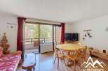 Discover this charming property featuring a cozy living space with a dining area and a balcony offering stunning views.