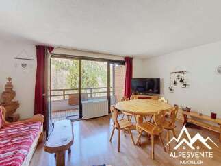 Discover this charming property featuring a cozy living space with a dining area and a balcony offering stunning views.
