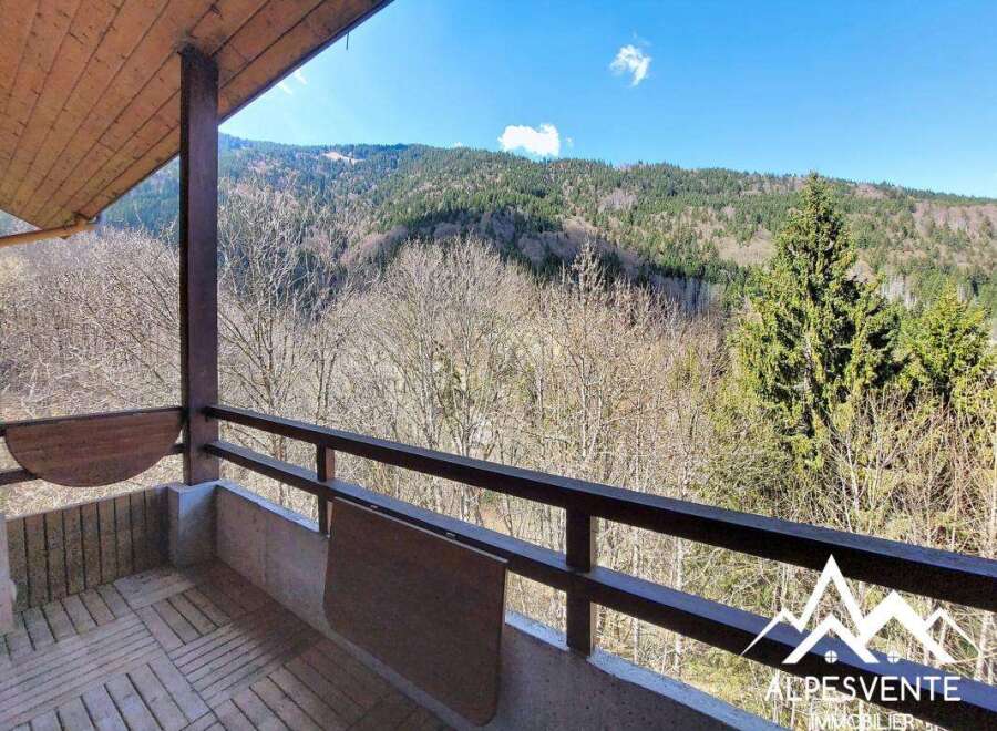 Enjoy breathtaking mountain views from this charming balcony.