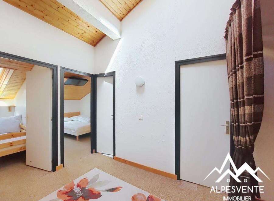 Discover this charming property featuring a bright and airy interior with a unique architectural design.