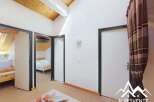 Discover this charming property featuring a bright and airy interior with a unique architectural design.