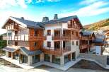 Discover the charm of this stunning multi-story property, featuring a blend of modern design and natural elements.
