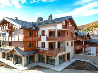 Discover the charm of this stunning multi-story property, featuring a blend of modern design and natural elements.