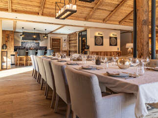 Experience luxury living in this stunning property featuring a spacious dining area perfect for entertaining.