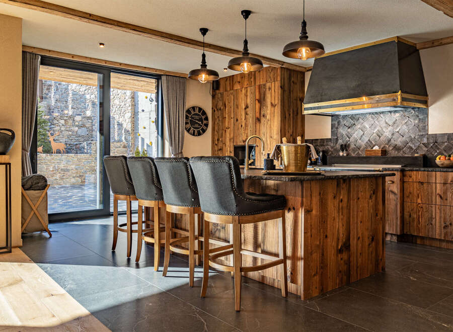 This stunning kitchen boasts a rustic yet modern design, perfect for entertaining and everyday living.