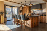 This stunning kitchen boasts a rustic yet modern design, perfect for entertaining and everyday living.