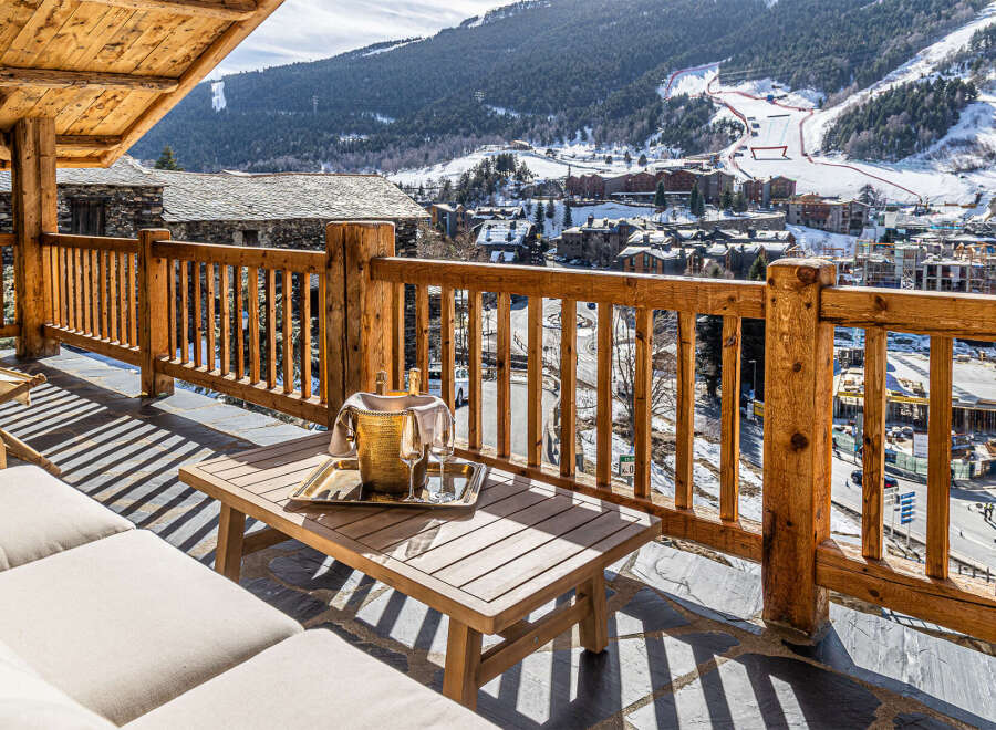 Enjoy breathtaking mountain views from this luxurious balcony.