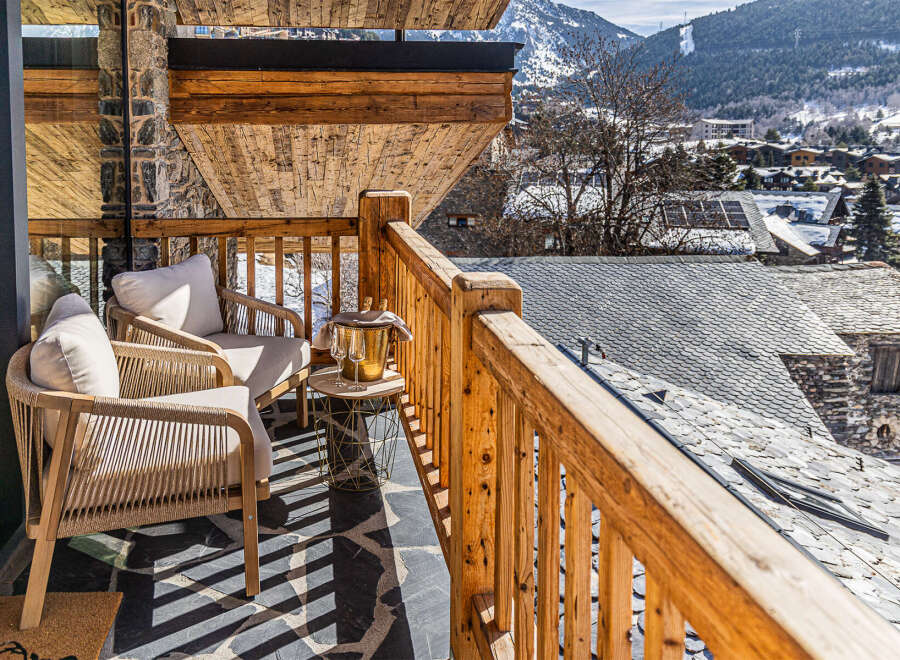 Enjoy breathtaking mountain views from this stunning balcony.