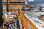 Enjoy breathtaking mountain views from this stunning balcony.