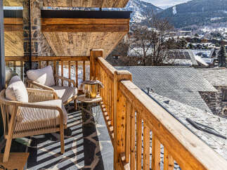 Enjoy breathtaking mountain views from this stunning balcony.