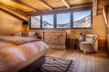 Experience the ultimate in alpine luxury with this stunning bedroom.