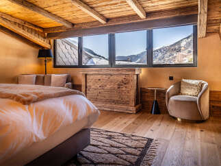 Experience the ultimate in alpine luxury with this stunning bedroom.