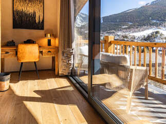 Experience luxury living with this stunning property, featuring a beautifully designed interior and breathtaking mountain views.