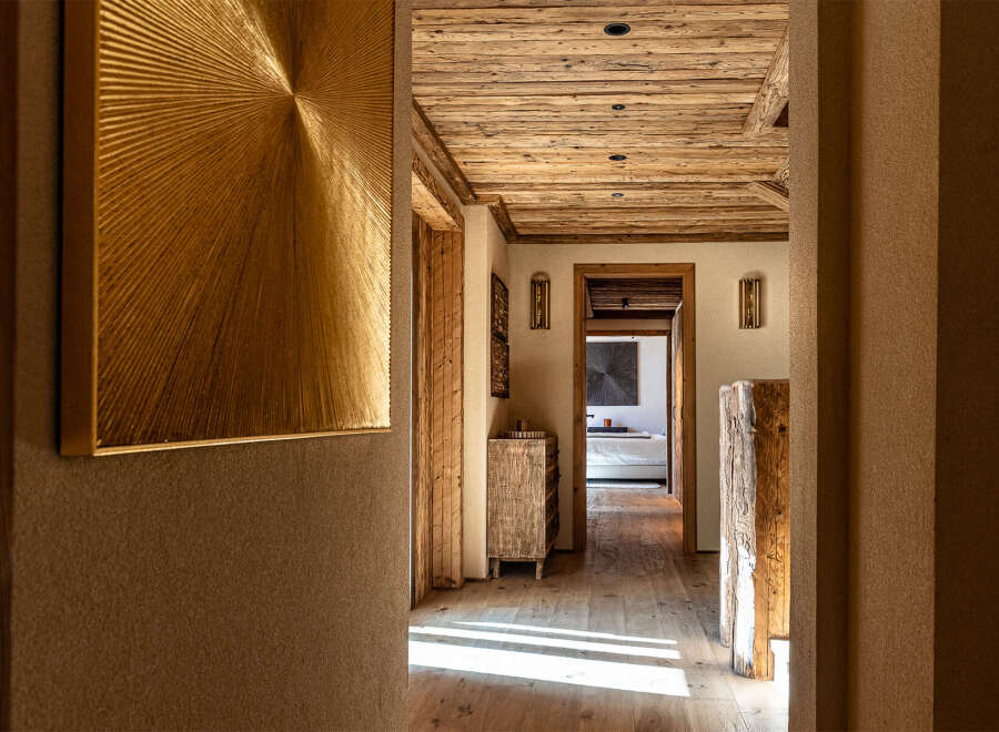 Step into luxury with this stunning property, showcasing exquisite wooden details and a warm, inviting ambiance.