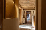 Step into luxury with this stunning property, showcasing exquisite wooden details and a warm, inviting ambiance.