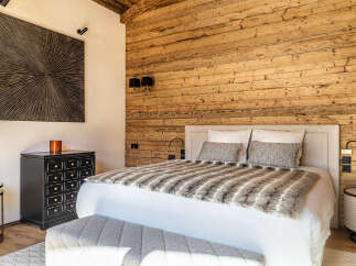 Experience luxury and comfort in this stunning bedroom.
