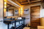 Experience rustic elegance in this stunning bathroom.