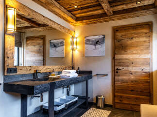 Experience rustic elegance in this stunning bathroom.