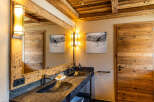 Experience rustic elegance in this stunning bathroom.