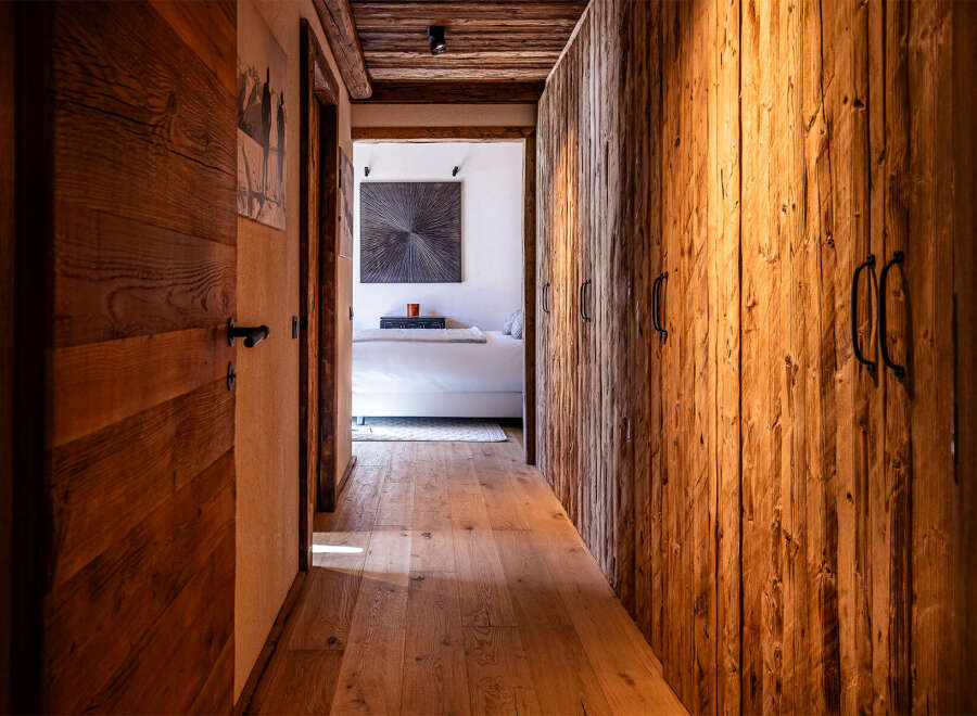 Step into rustic elegance with this stunning hallway.