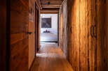 Step into rustic elegance with this stunning hallway.