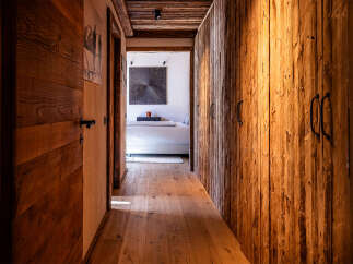 Step into rustic elegance with this stunning hallway.
