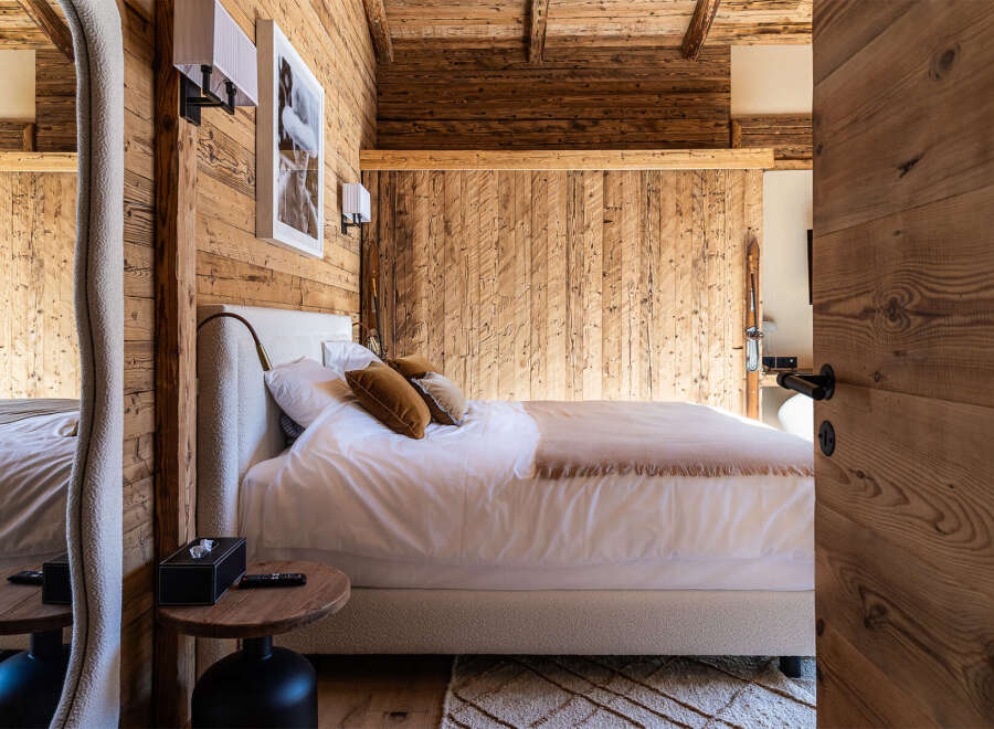 Experience rustic elegance in this stunning bedroom.