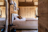 Experience rustic elegance in this stunning bedroom.