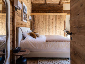 Experience rustic elegance in this stunning bedroom.