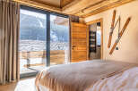 Experience the ultimate mountain retreat in this stunning bedroom.