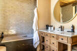 Step into luxury with this stunning bathroom featuring a sleek design and high-end finishes.