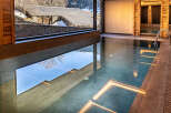 Indulge in luxury with this stunning indoor pool, offering a serene escape with breathtaking views.
