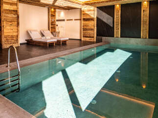 Indulge in luxury at this stunning indoor pool, perfect for relaxation and rejuvenation.