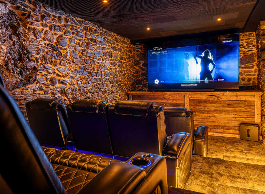 Experience luxury and entertainment in this stunning home theater.