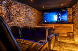 Experience luxury and entertainment in this stunning home theater.