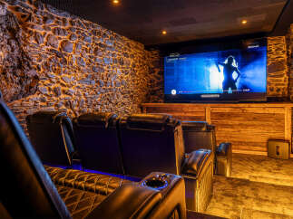 Experience luxury and entertainment in this stunning home theater.