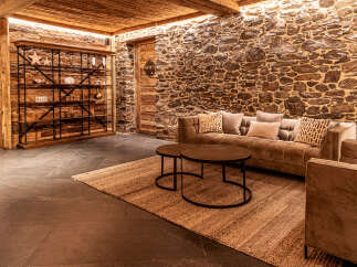 Step into luxury with this stunning property featuring a cozy living area.