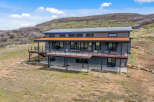 Discover modern living in this stunning home, perfectly situated in a serene natural setting.