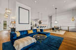 Step into luxury with this stunning property, showcasing a spacious open-concept living area.