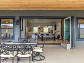 Step into luxury with this stunning property featuring an expansive outdoor patio, perfect for entertaining or relaxing.