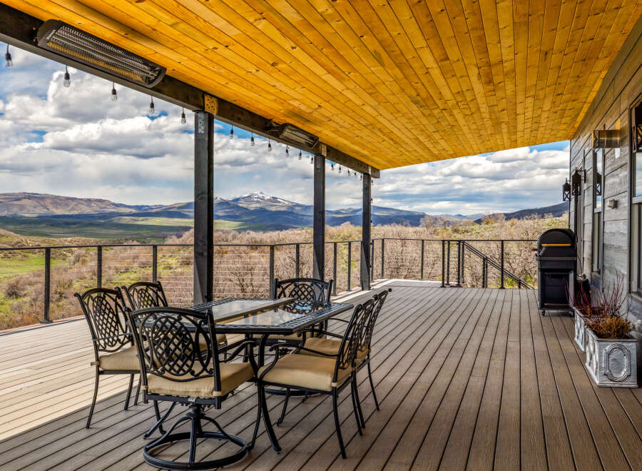 Enjoy breathtaking mountain views from this stunning outdoor deck.
