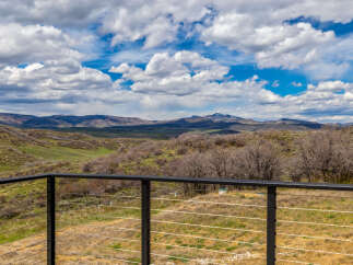 Enjoy breathtaking mountain views from this stunning property! This home offers a serene escape with its expansive outdoor space and modern design.