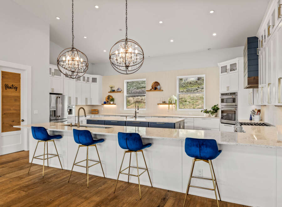 This stunning kitchen boasts a modern design with high-end finishes.