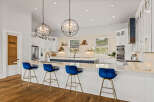 This stunning kitchen boasts a modern design with high-end finishes.