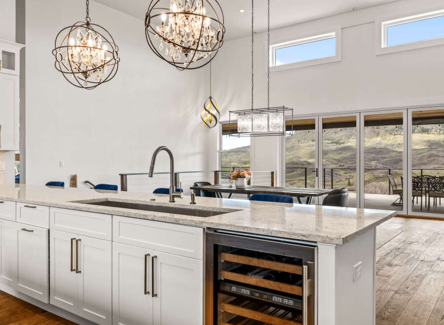This stunning kitchen boasts a modern design with high-end finishes.