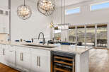 This stunning kitchen boasts a modern design with high-end finishes.