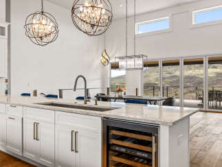 This stunning kitchen boasts a modern design with high-end finishes.