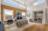 This stunning bedroom boasts a luxurious and inviting atmosphere, perfect for relaxation.